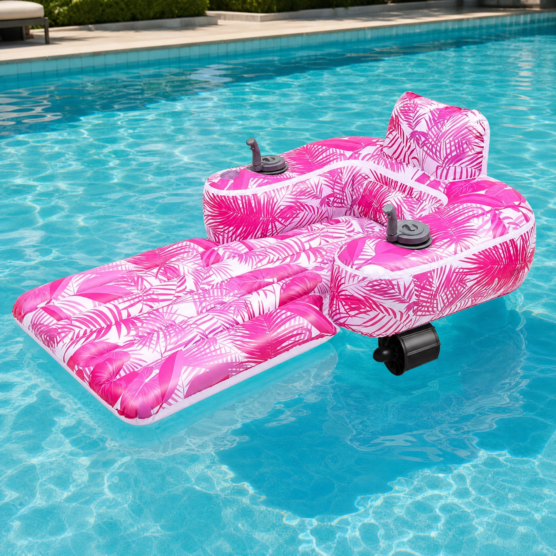 GlideFloat motorized pool lounger floating in a swimming pool